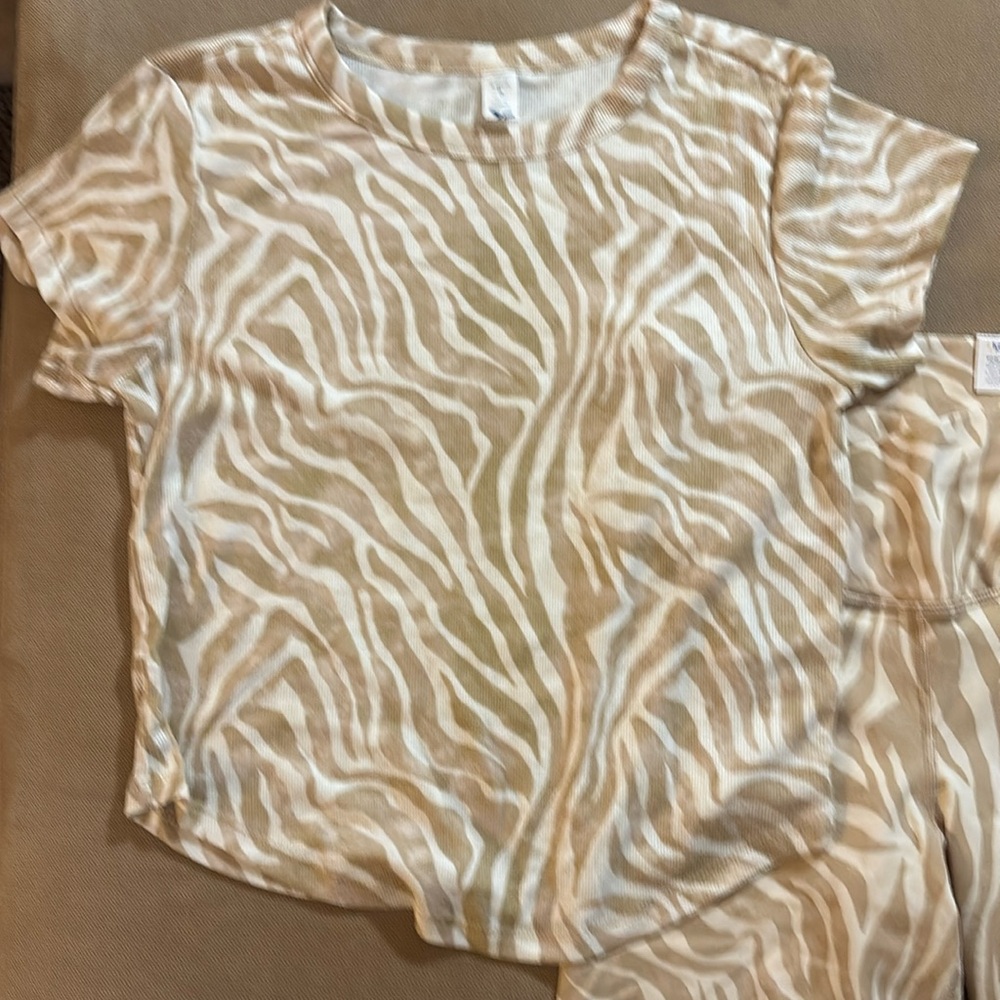 Matching set, top and bike shorts, women's size med . Animal print.